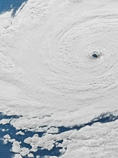 A simulated hurricane formation on a grid texture background.